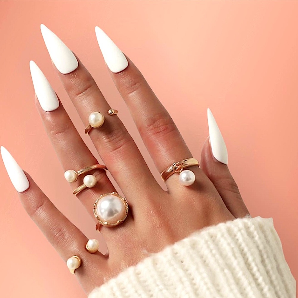 Fashion Gold and Pearl Rings 5 rings  size 6 and 7